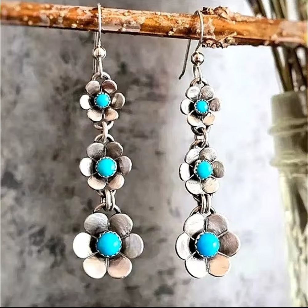 Turquoise hand carved flower shaped dangle earrings